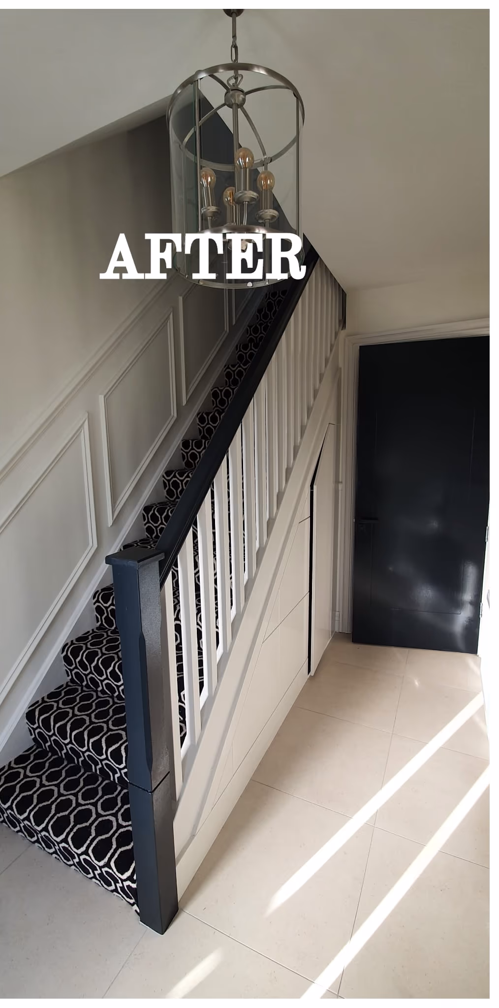 Freshly painted hall, stairs and landing with panelled woodwork in a Dublin home